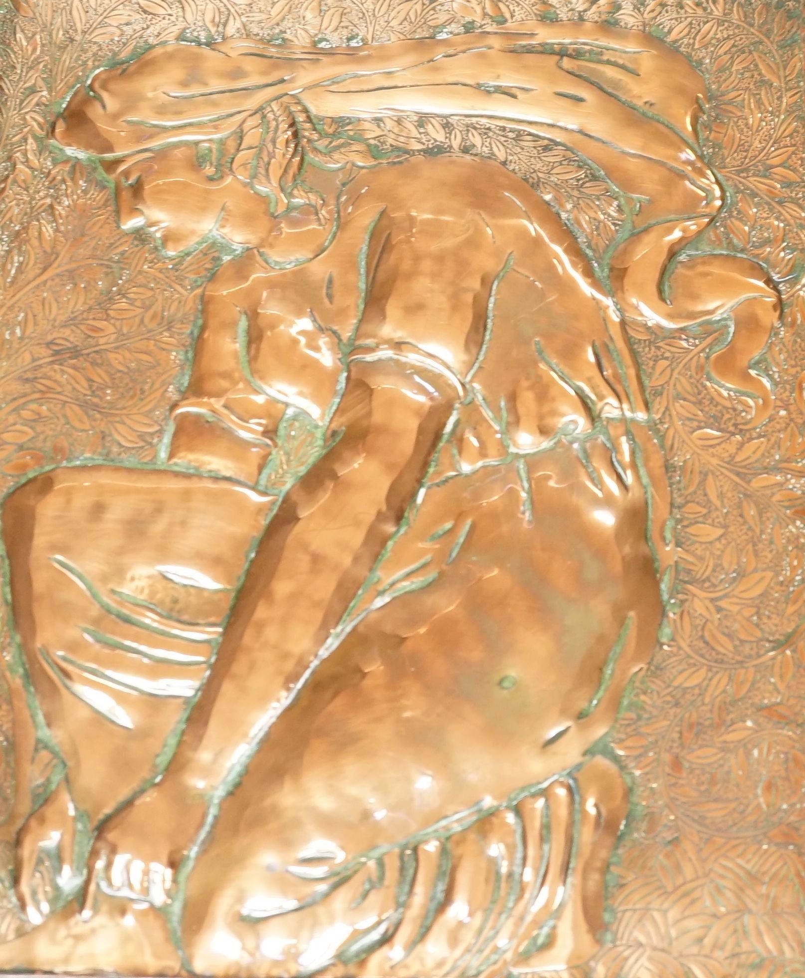 An Arts & Crafts repousse copper plaque, in oak frame, c.1900 - 38 x 43cm